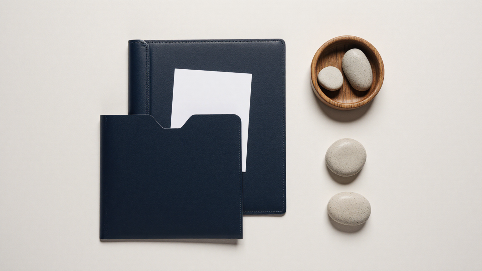 Closed folder and blank card representing an organized evidence file